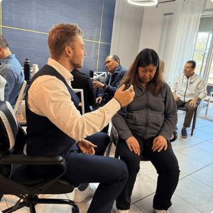 client-experiencing-a-breakthrough-moment-during-a-one-on-one-nlp-and-hypnosis-session